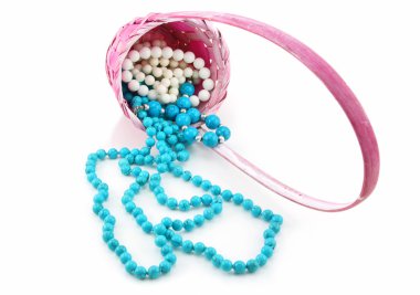 Colored Pearl Beads in Pink Wicker Baske clipart