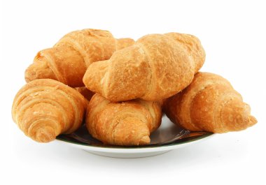 Group of Croissants on Saucer Isolated o clipart