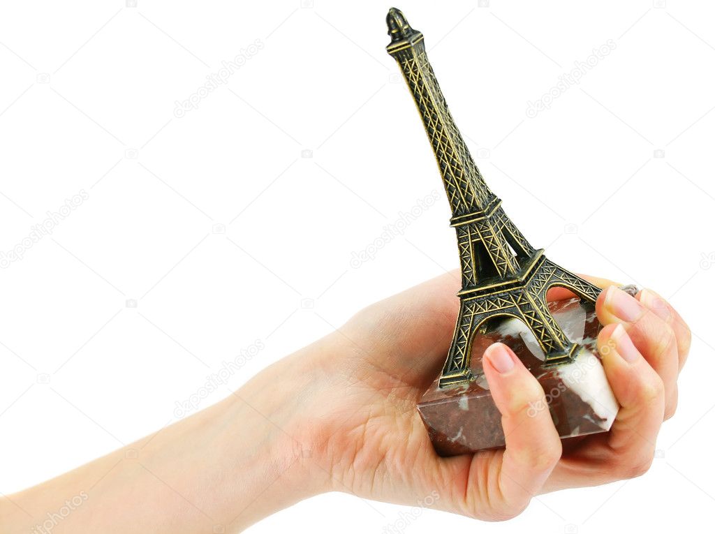 Woman's hand holding statuette