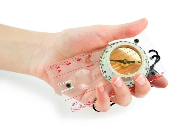 Ženská ruka drží transparentní tekuté kompas, samostatný — Stock fotografie