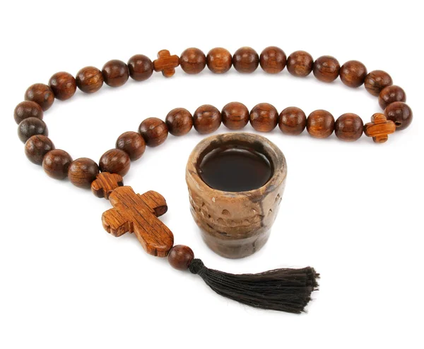 Wood rosary and ancient glass — Stock Photo, Image