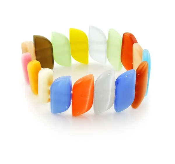 Colored amber bracelet isolated — Stock Photo, Image