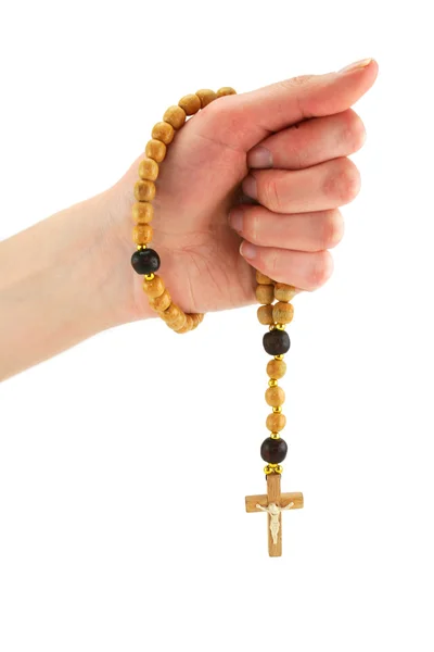 stock image Female hand holds wooden rosary