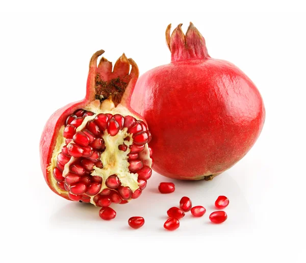 Fruta de granada en rodajas maduras con semillas — Foto de Stock