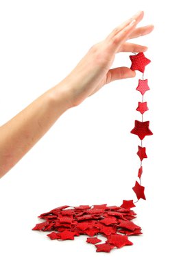 Female hand holds star-shaped garland clipart