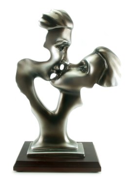 Statuette of man and woman kissing isolated clipart