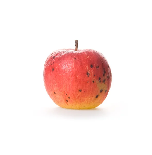 Maturo deterioramento mela rossa isolato — Foto Stock