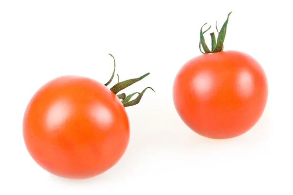 Due pomodori rossi maturi isolati — Foto Stock