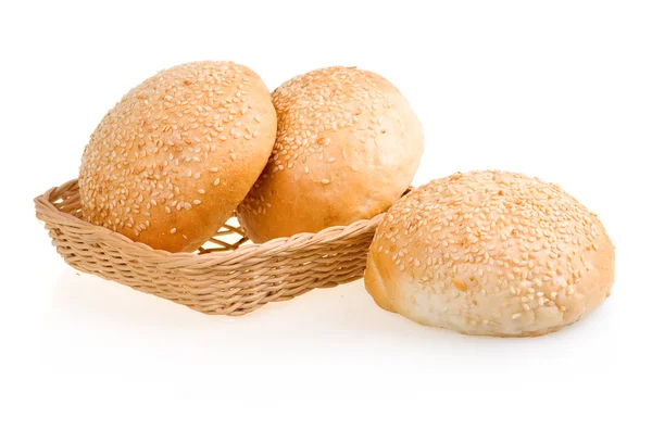 Three Baked Buns with Sesame in Basket — Stock Photo, Image