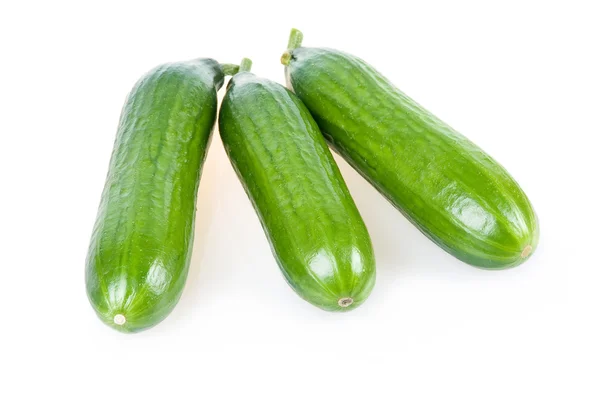Üç olgun yeşil salatalık izole — Stok fotoğraf