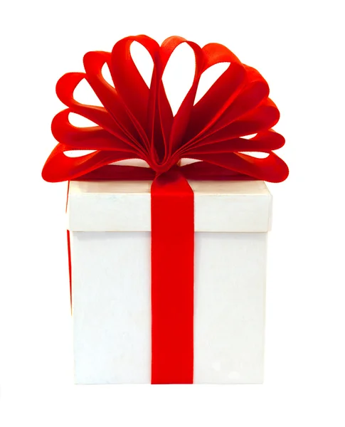 Weiße Schachtel verpackt rote Schleife — Stockfoto