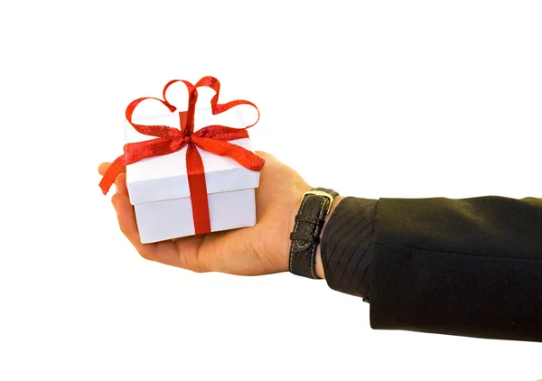 Man's hand with a gift — Stock Photo, Image