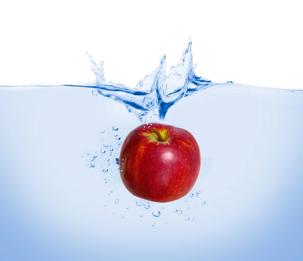 stock image Red apple in the water