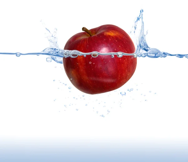 stock image Red apple in the water