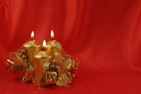 Red background burning candles — Stock Photo, Image