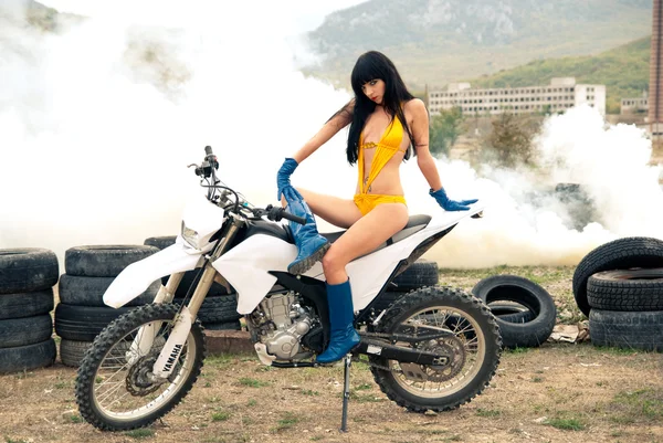 stock image Girl with the long hair on motor cycle