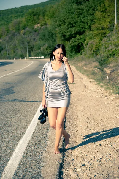 stock image Beautiful Girl on the road