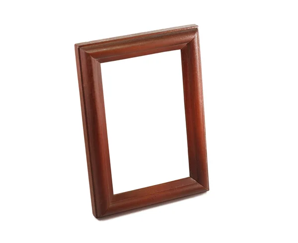 Одна коричневая деревянная рамка на белом фоне — стоковое фото