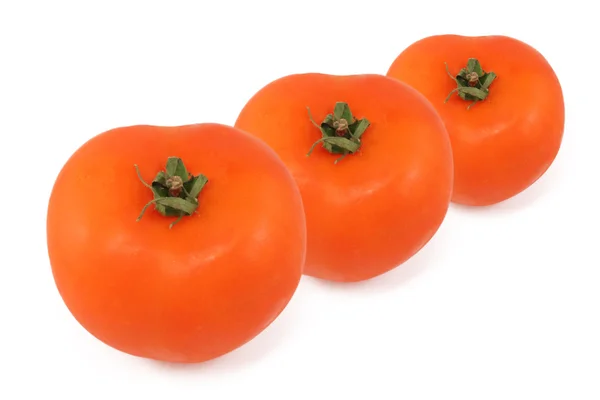 Tres tomates rojos frescos — Foto de Stock