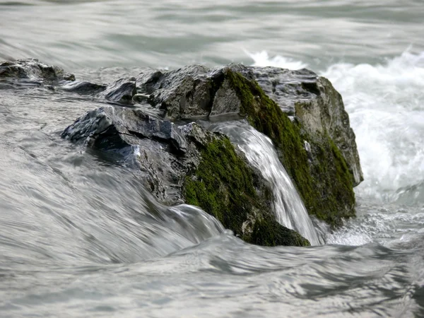 Big stone in flow river — Stock Photo, Image