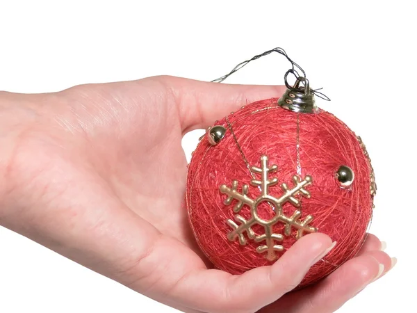 Mão segura um ornamento de Natal Imagens De Bancos De Imagens Sem Royalties