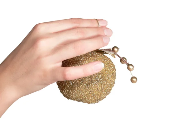 La mano femenina sostiene una manzana de oro aislada Fotos de stock libres de derechos