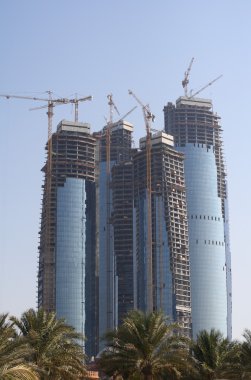 Abu Dhabi skyline building at day clipart