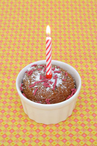 Cupcake en brandende kaars — Stockfoto
