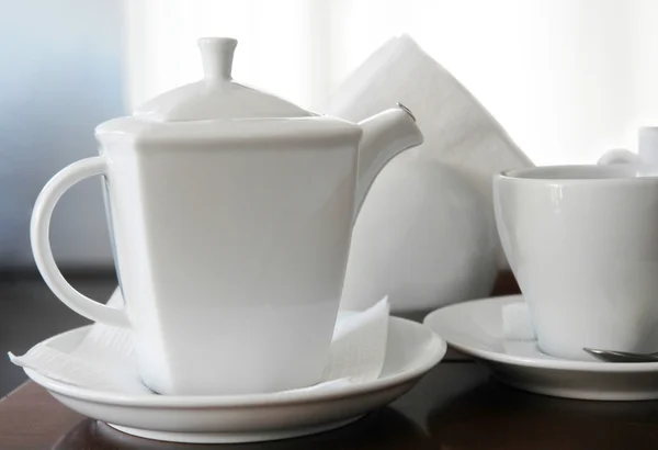 Чашка и чайник — стоковое фото