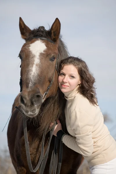 Inseparable - young girl and bay horse — Stock Photo, Image