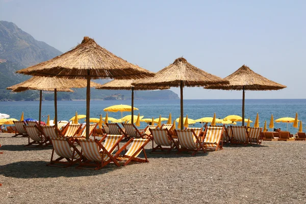 stock image Beach umbrellas and plank beds