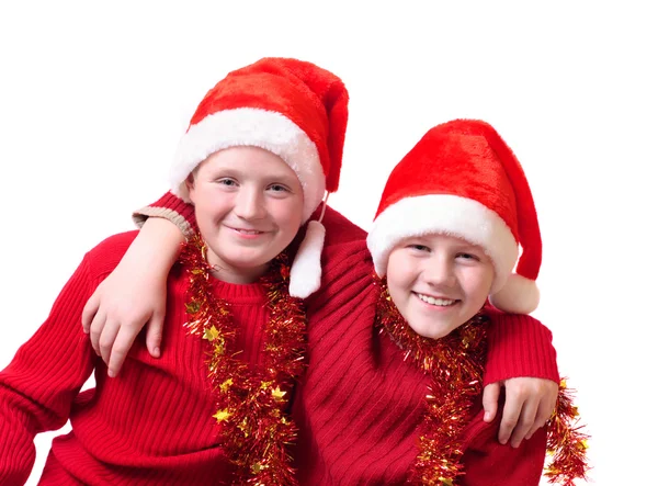 クリスマスの赤い帽子の子供たち — ストック写真