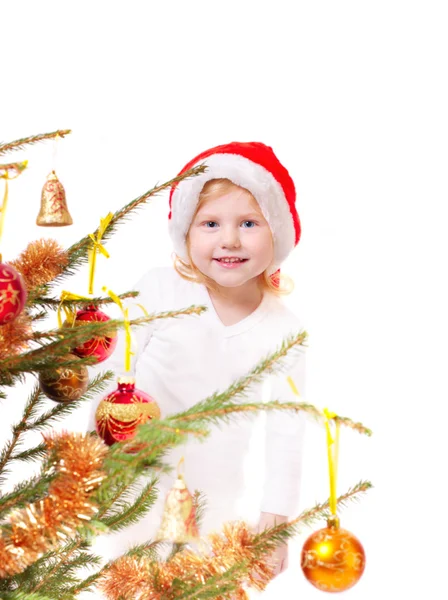 Liten flicka med julgran isolerade — Stockfoto