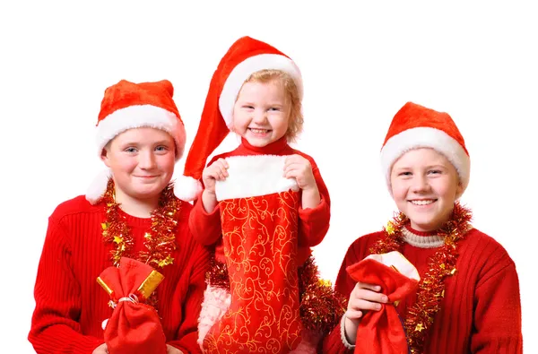 Barn i röd jul hatt — Stockfoto