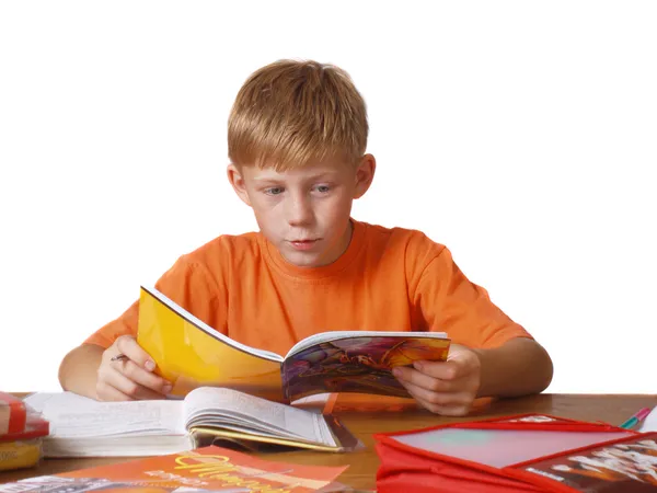 Niño con libro de texto —  Fotos de Stock