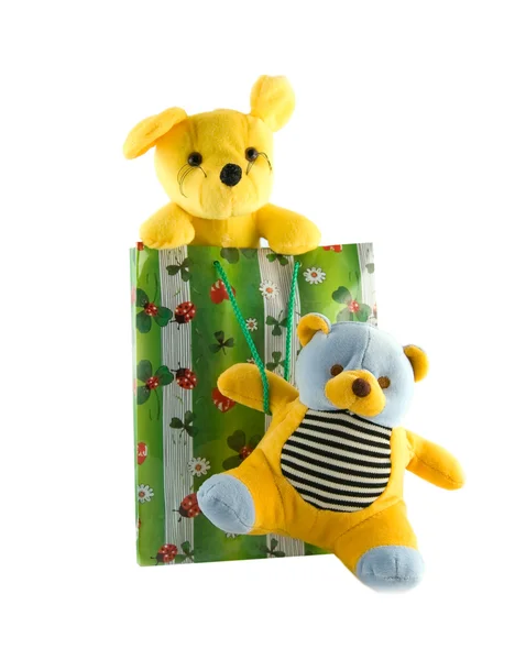 Toys in a gift package on a white backgr — Stock Photo, Image