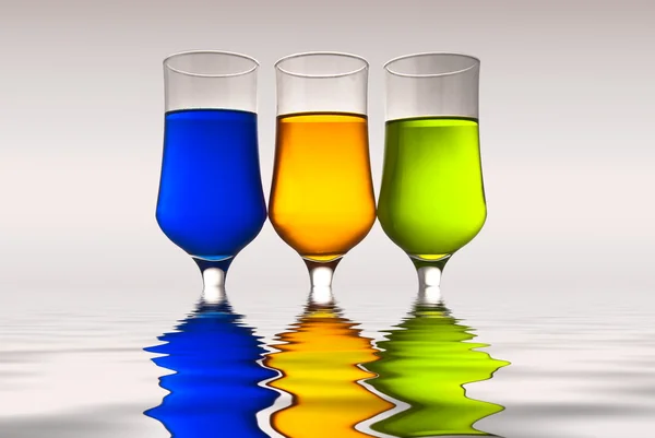 Glasses with multi-coloured drinks and r — Stock Photo, Image