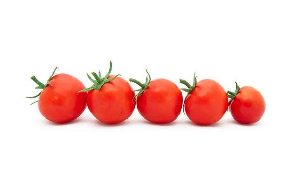 Belos tomates maduros em um bacgr branco — Fotografia de Stock