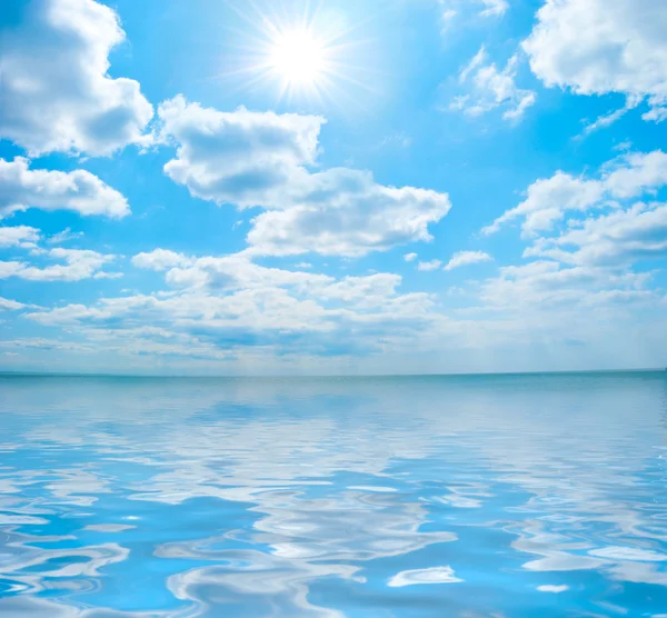 Shining sun among the blue sky — Stock Photo, Image