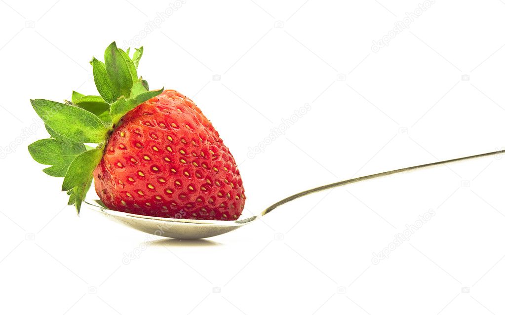 Ripe strawberry on a spoon