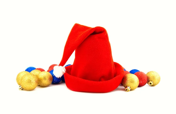 Čepice vánoční červené na bílém pozadí — Stock fotografie