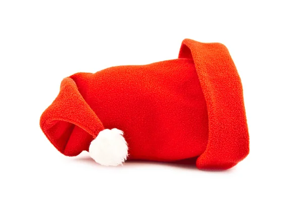 Красная шапочка на белом фоне — стоковое фото