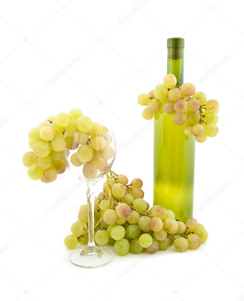 Bottle of white wine and white grapes