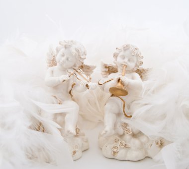 Figurines in the form of the angels clipart
