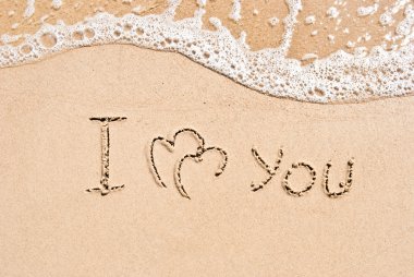 Inscription on sand I love you clipart