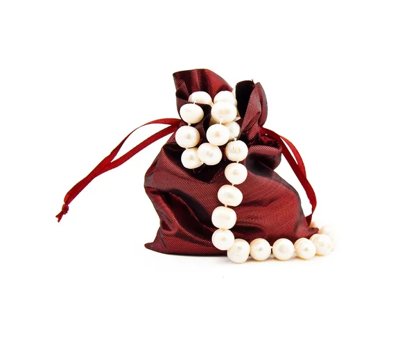 Bag for a gift with a pearl necklace — Stock Photo, Image