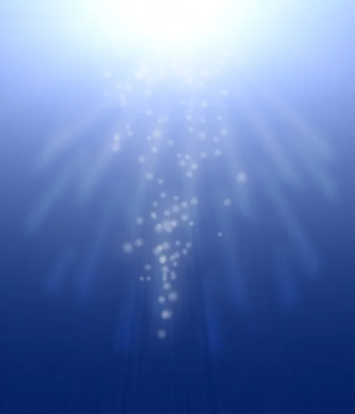 Feixe de luz brilhante debaixo de água — Fotografia de Stock