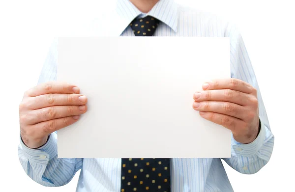 Чистая белая карточка в руках человека — стоковое фото
