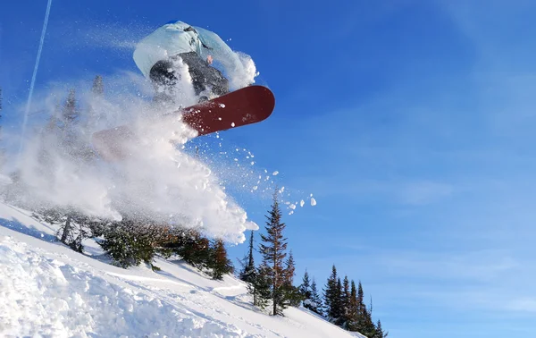 Saltar snowboarder — Foto de Stock