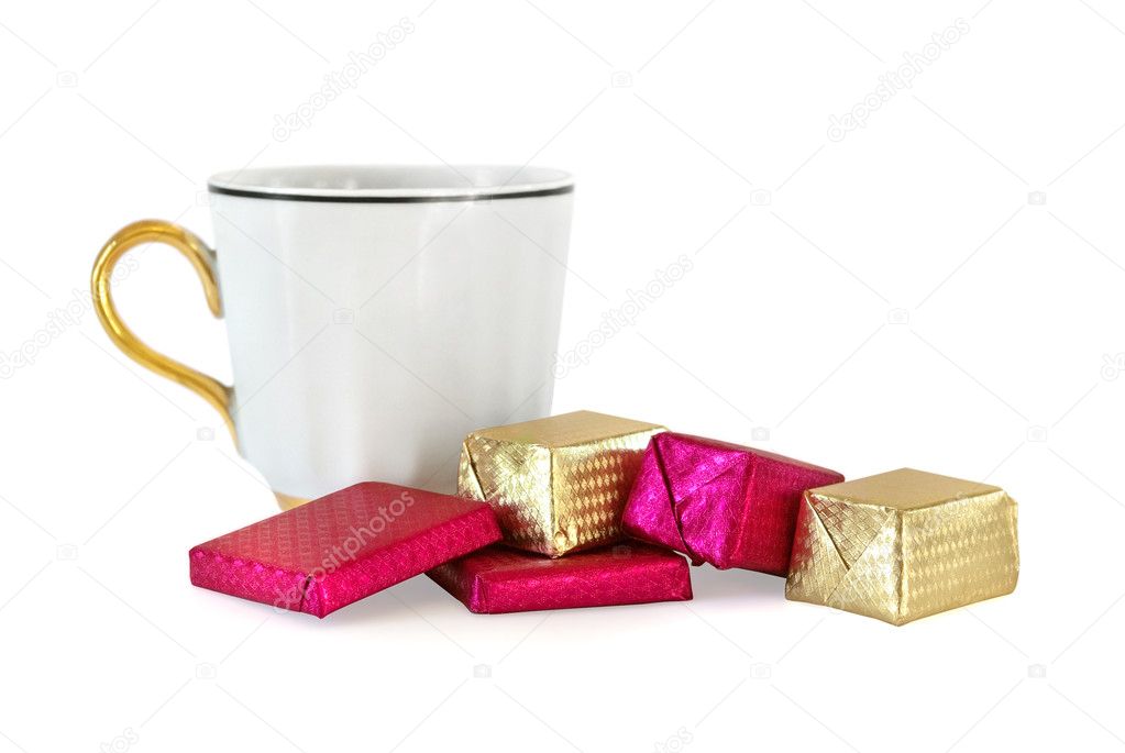 Cup and sweet chocolates